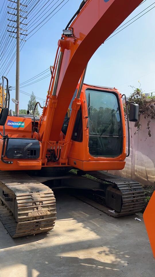 2023 Doosan DX140LC crawler excavator, front three-quarter view