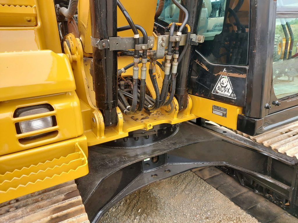 2010 Caterpillar 312D crawler excavator cab and hydraulic detail 2010 Caterpillar 312D crawler excavator cab and hydraulic detail
