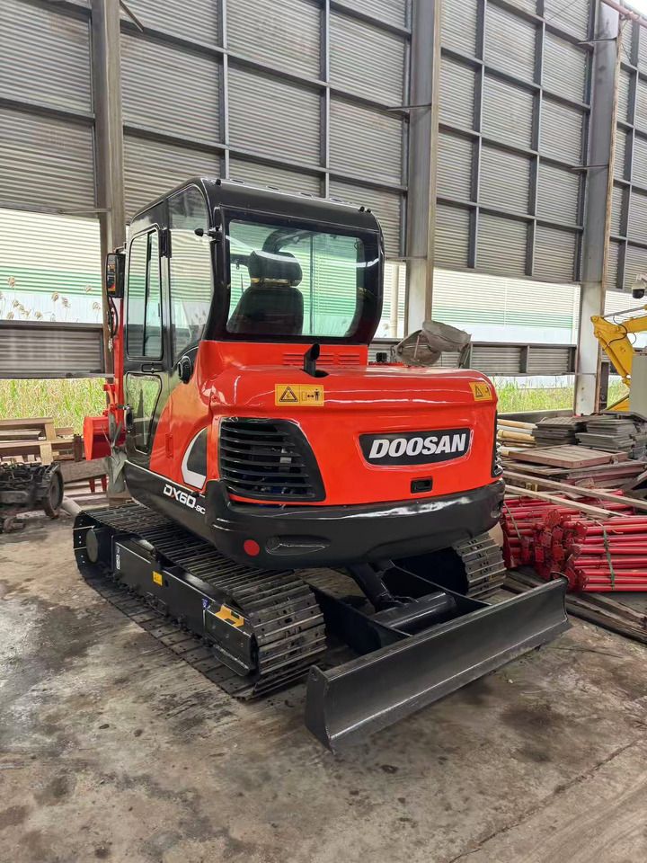 2020 Doosan DX60-9C mini excavator, rear three-quarter view
