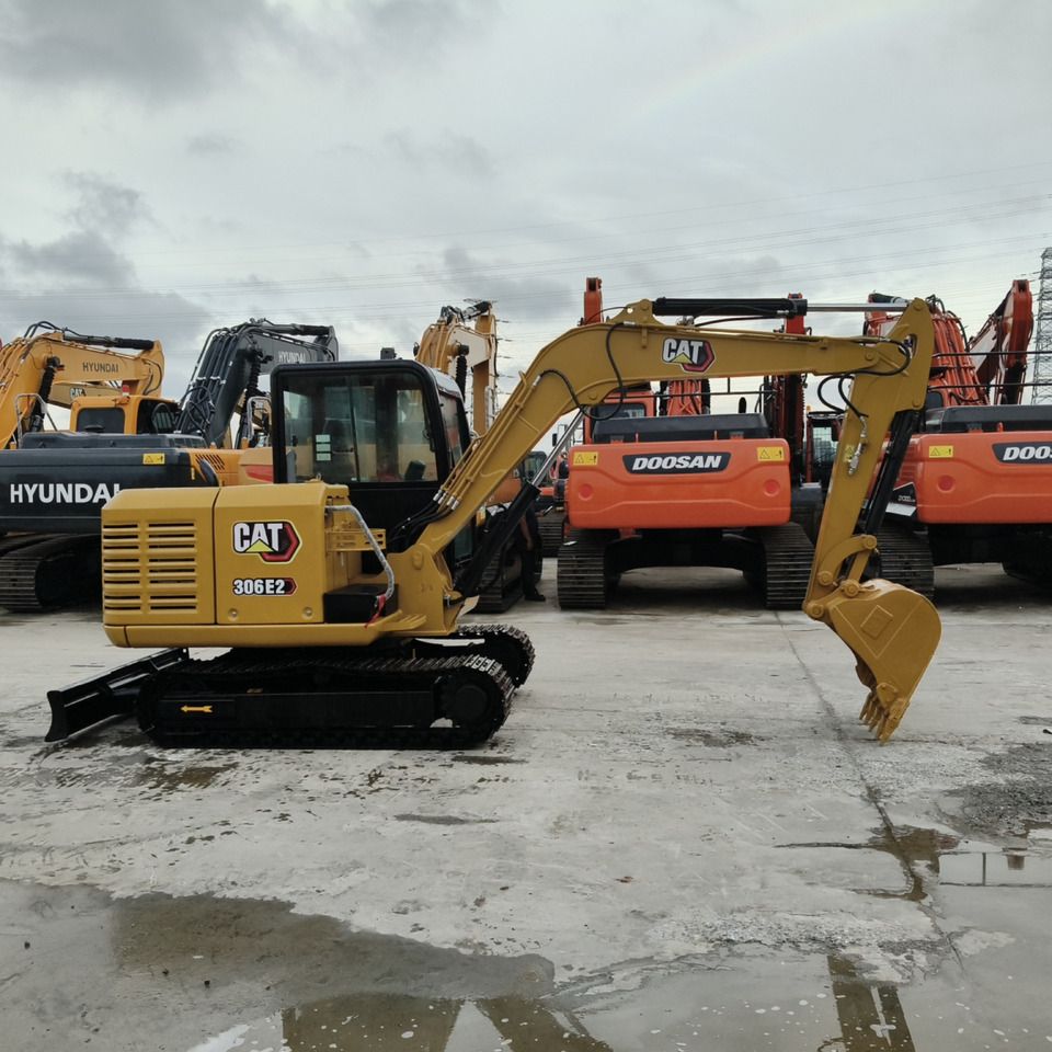 2022 Caterpillar 306E2 mini excavator side view 2022 Caterpillar 306E2 mini excavator side view