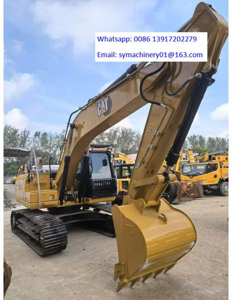 2022 Caterpillar 320GX crawler excavator, front three-quarter view