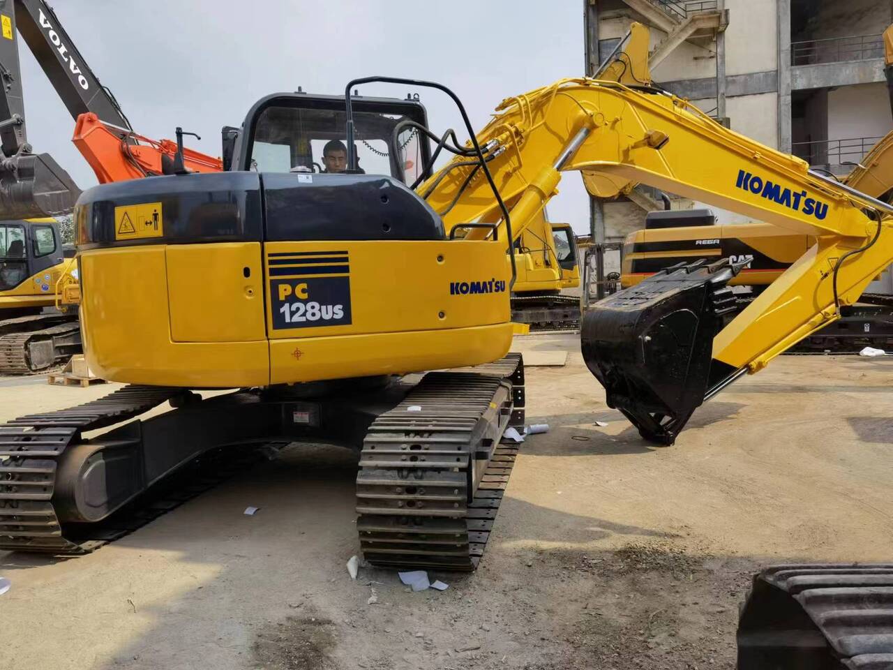 2018 Komatsu PC128US mini excavator rear three-quarter view 2018 Komatsu PC128US mini excavator rear three-quarter view