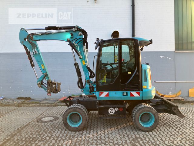 2019 Wacker Neuson ZM70 wheel excavator, side view 2019 Wacker Neuson ZM70 wheel excavator, side view