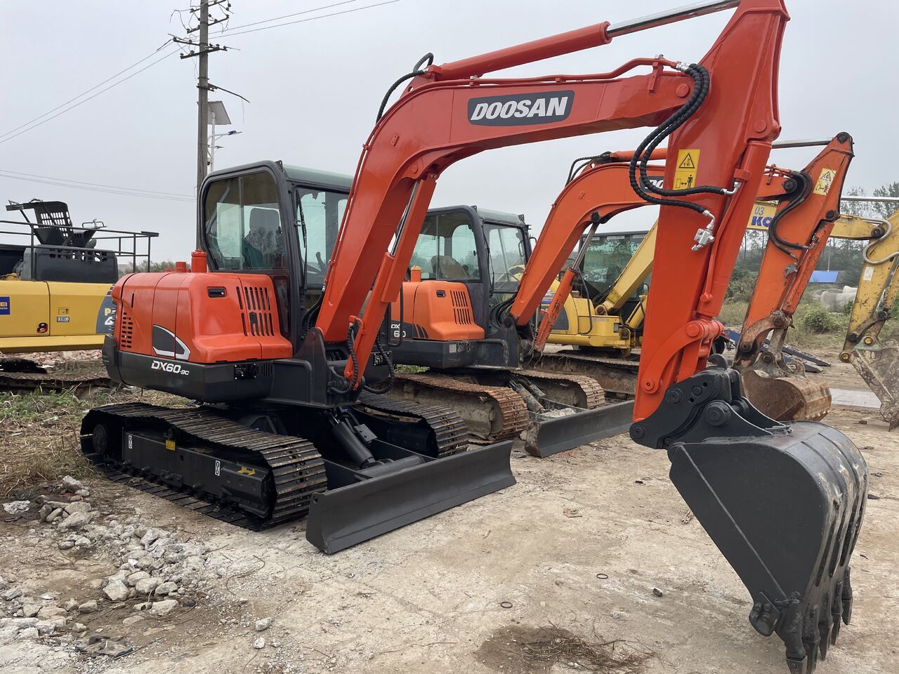 2023 Doosan DX60-9C mini excavator, side view