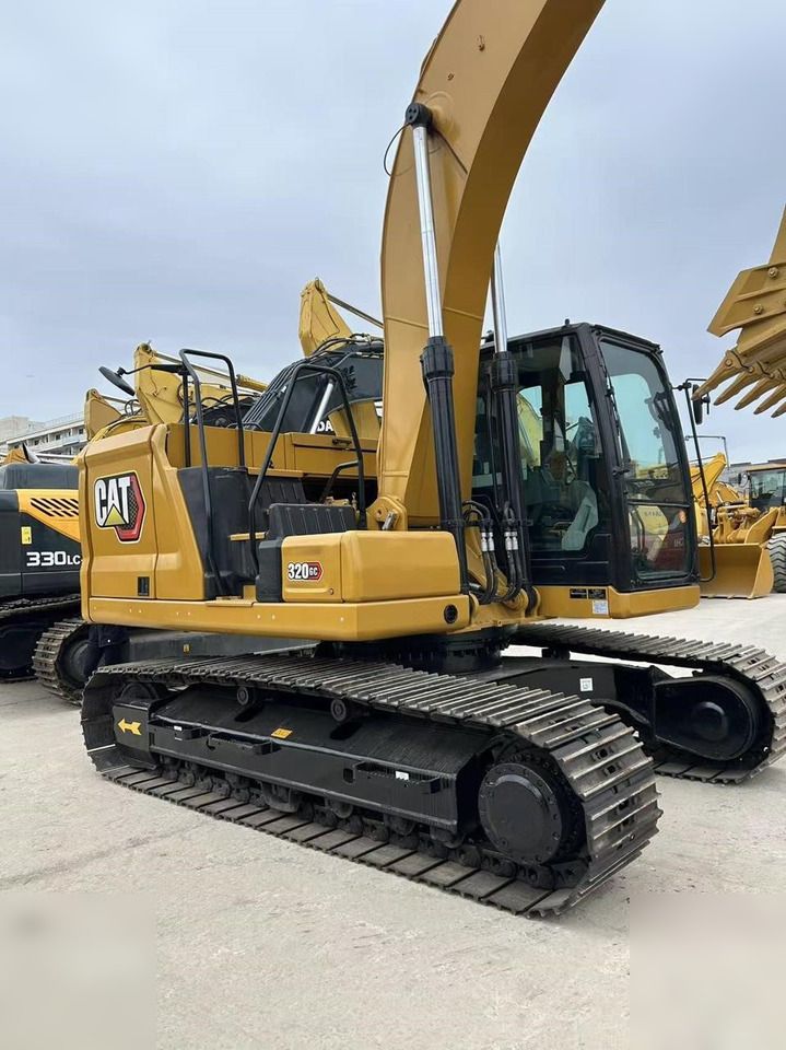 2023 Caterpillar 320GC crawler excavator, side view
