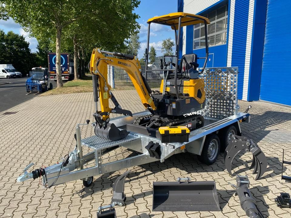 Berger Kraus BK1000JS mini excavator on trailer, side view Berger Kraus BK1000JS mini excavator on trailer, side view