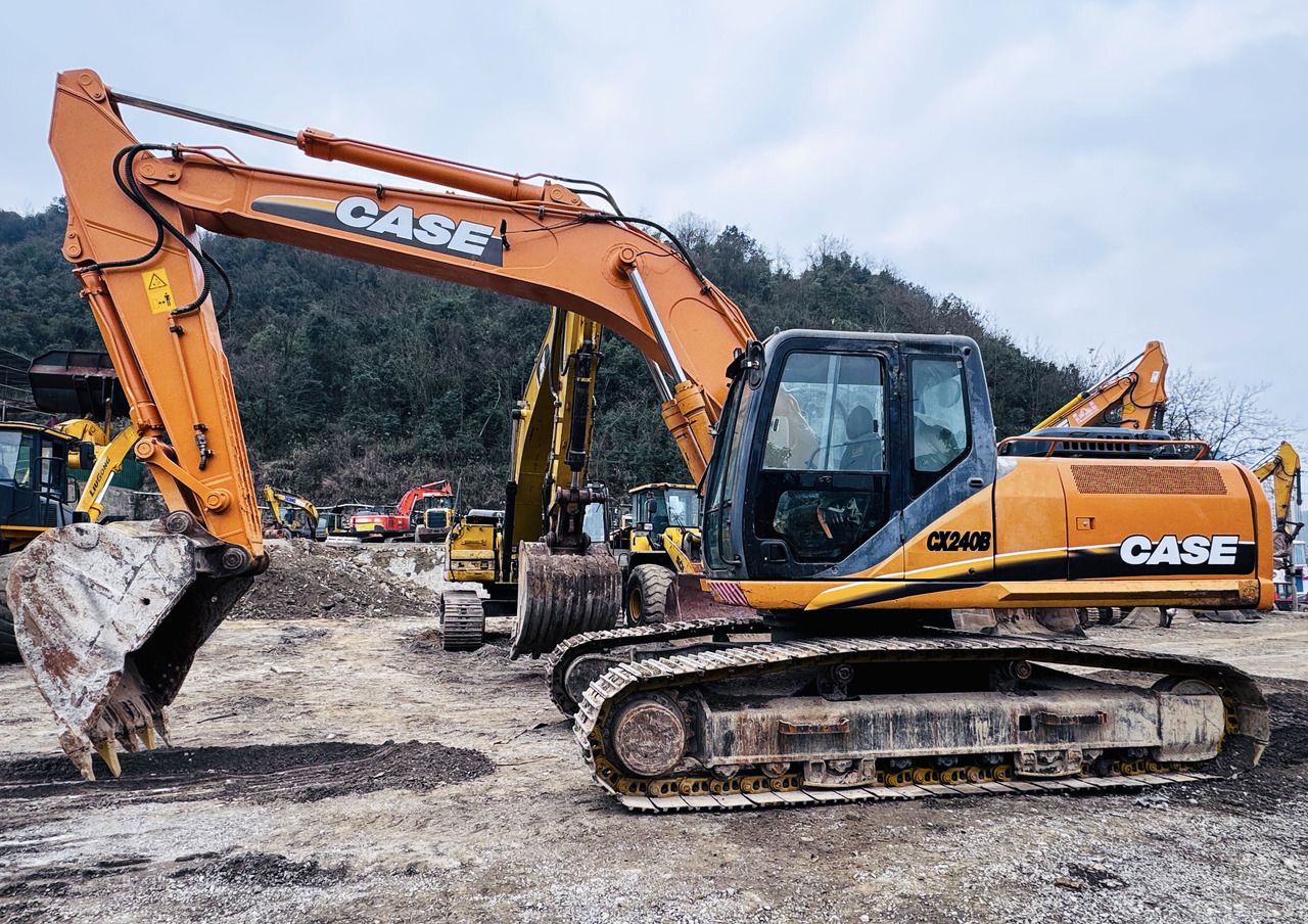 Case CX240B crawler excavator, side view Case CX240B crawler excavator, side view