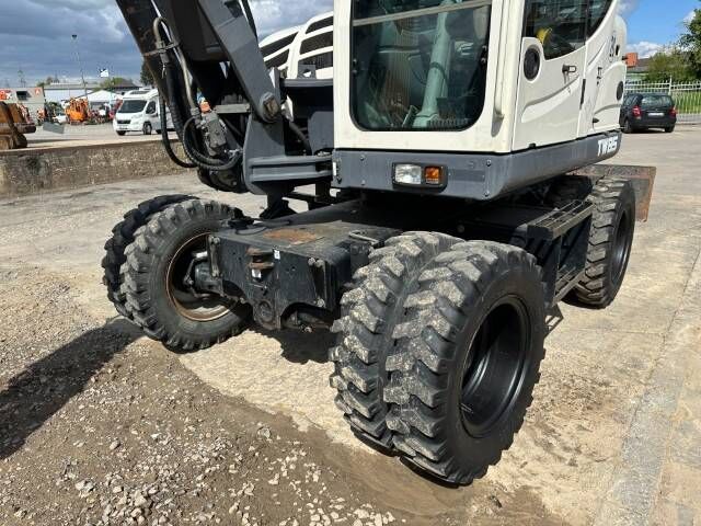 2011 Terex TW85 wheel excavator, front three-quarter view 2011 Terex TW85 wheel excavator, front three-quarter view