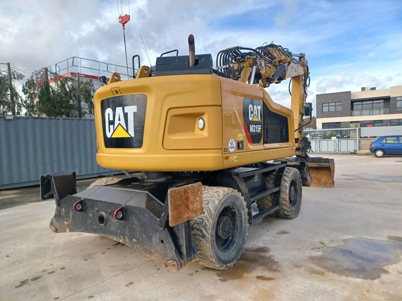 2018 Caterpillar M315F wheel excavator, rear three-quarter view