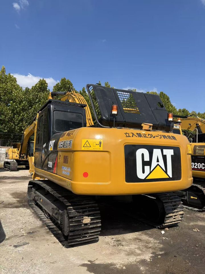 2024 Caterpillar KAT320D excavator, rear three-quarter view 2024 Caterpillar KAT320D excavator, rear three-quarter view