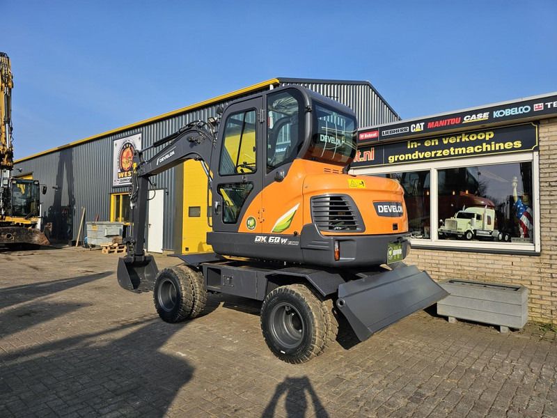 2024 Develon DX60WN ECO-1 wheel excavator, front three-quarter view