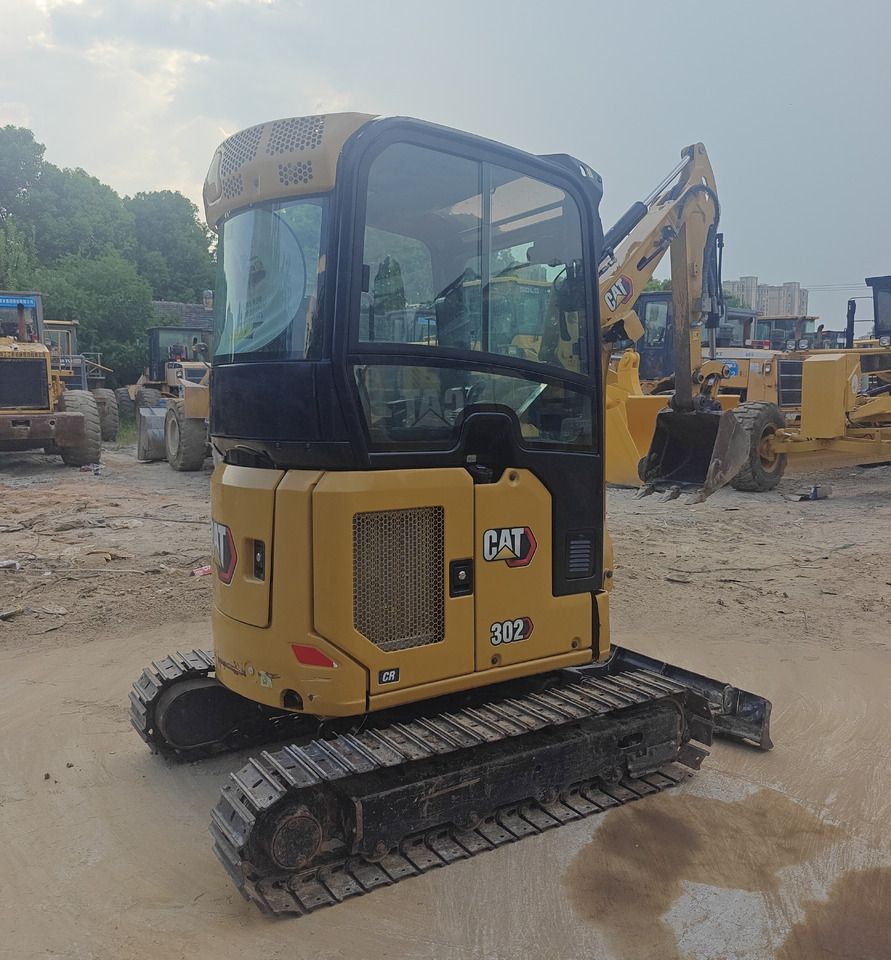 2020 Caterpillar 302CR mini excavator, rear three-quarter view