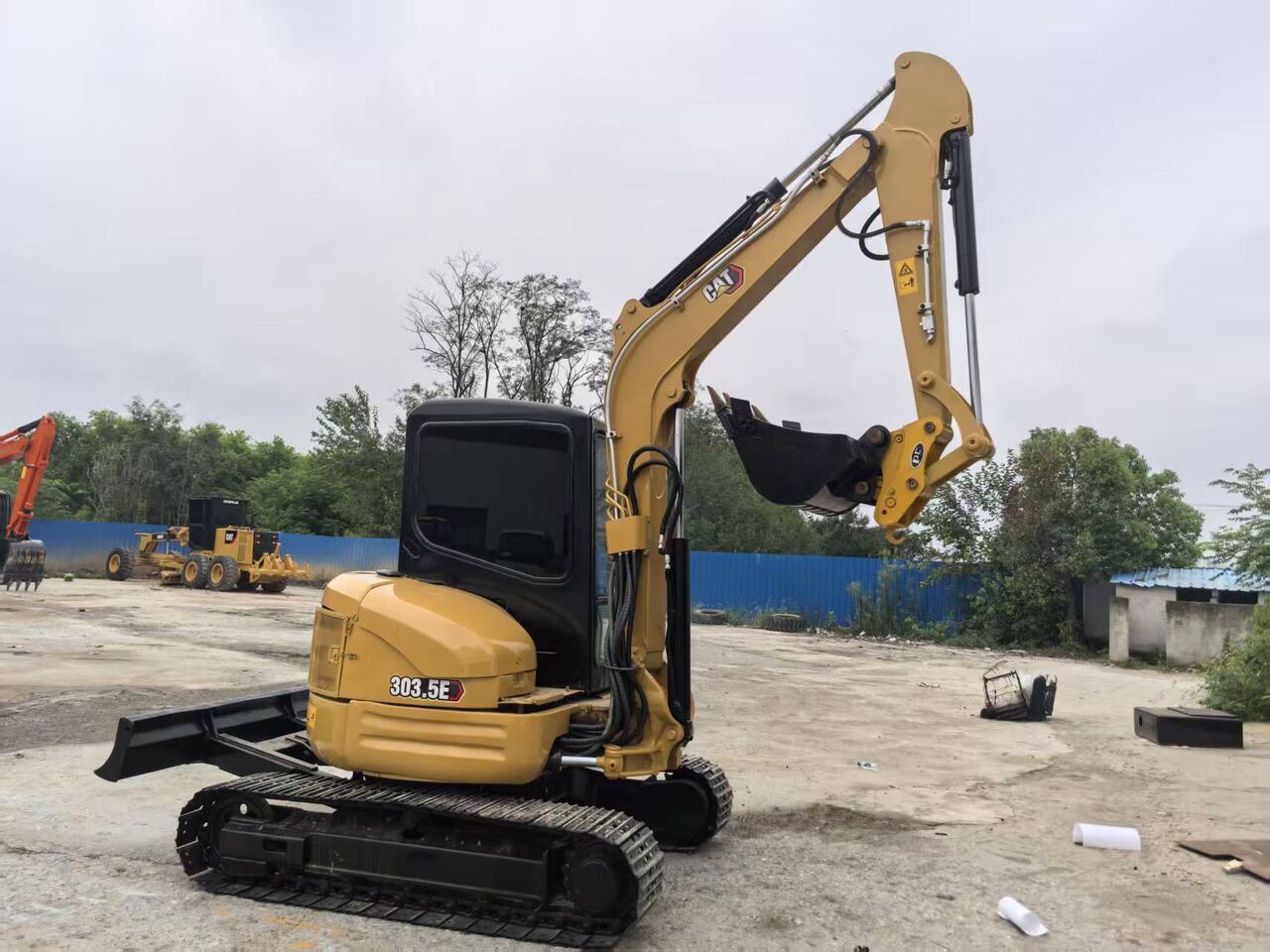 2022 Caterpillar 303.5E mini excavator, side profile view 2022 Caterpillar 303.5E mini excavator, side profile view