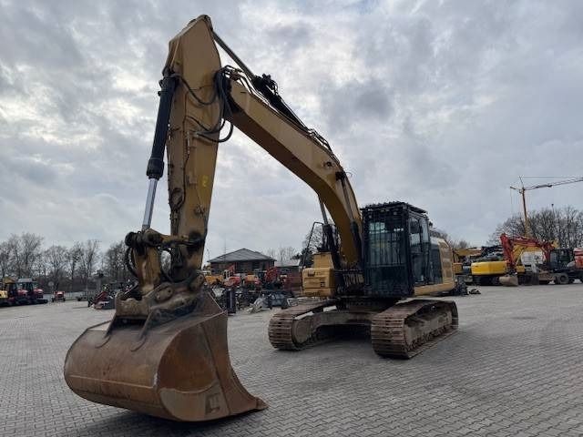 2017 Caterpillar 326FLN crawler excavator, front three-quarter view 2017 Caterpillar 326FLN crawler excavator, front three-quarter view