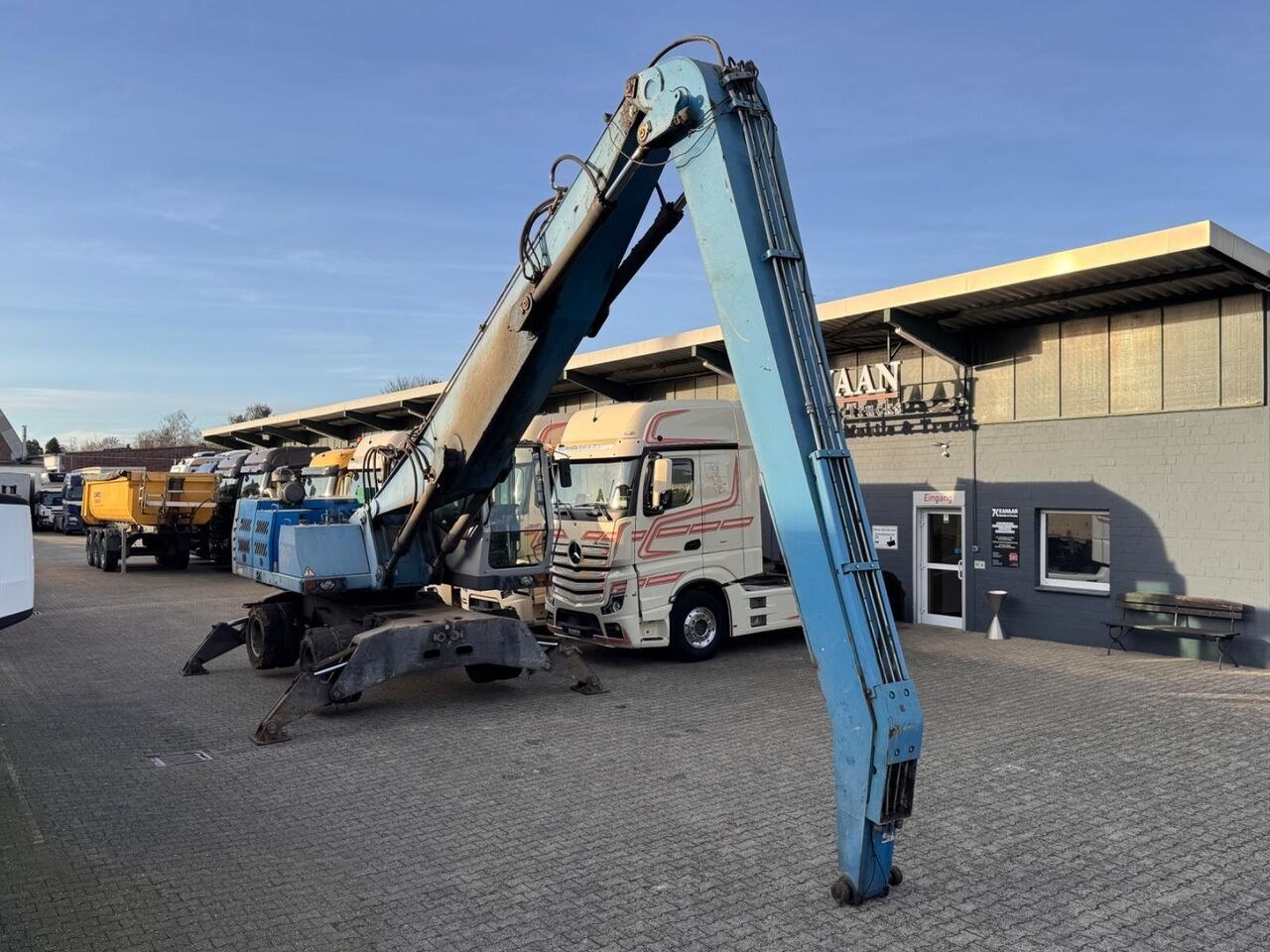 2012 Terex MHL 340 wheel excavator, rear three-quarter view