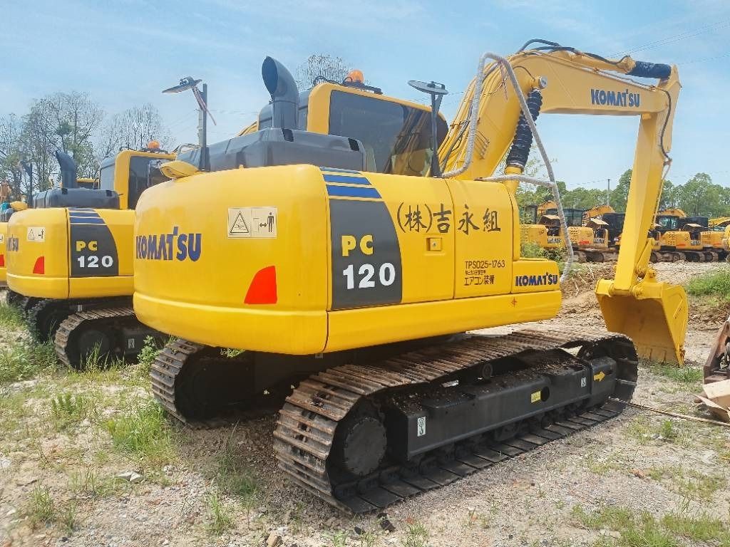 2023 Komatsu PC120 crawler excavator, rear three-quarter view 2023 Komatsu PC120 crawler excavator, rear three-quarter view