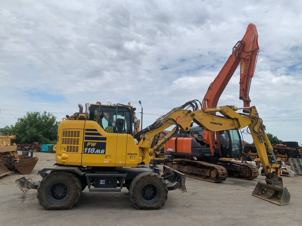 2018 Komatsu PW118MR-11W wheel excavator, side profile view