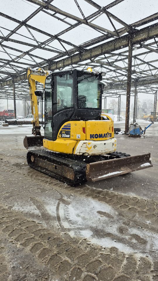 2021 Komatsu PC55MR-5 mini excavator, rear three-quarter view