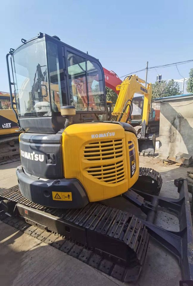 2018 Komatsu PC55MR-2 mini excavator, rear three-quarter view 2018 Komatsu PC55MR-2 mini excavator, rear three-quarter view