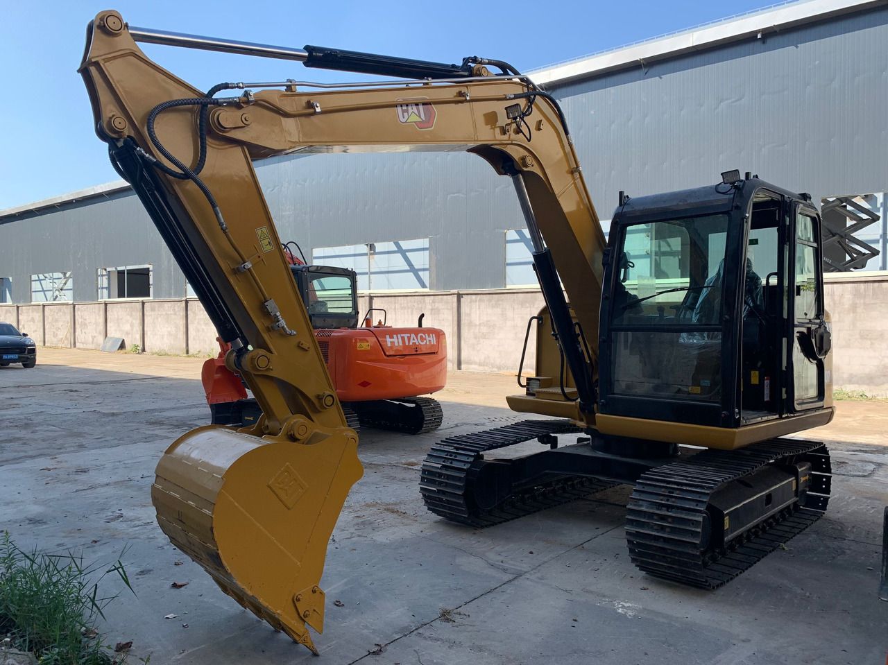 2023 Caterpillar 306E2 crawler excavator, side view 2023 Caterpillar 306E2 crawler excavator, side view