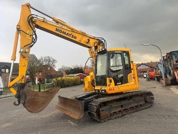 2015 Komatsu PC138US-10 crawler excavator, front three-quarter view 2015 Komatsu PC138US-10 crawler excavator, front three-quarter view