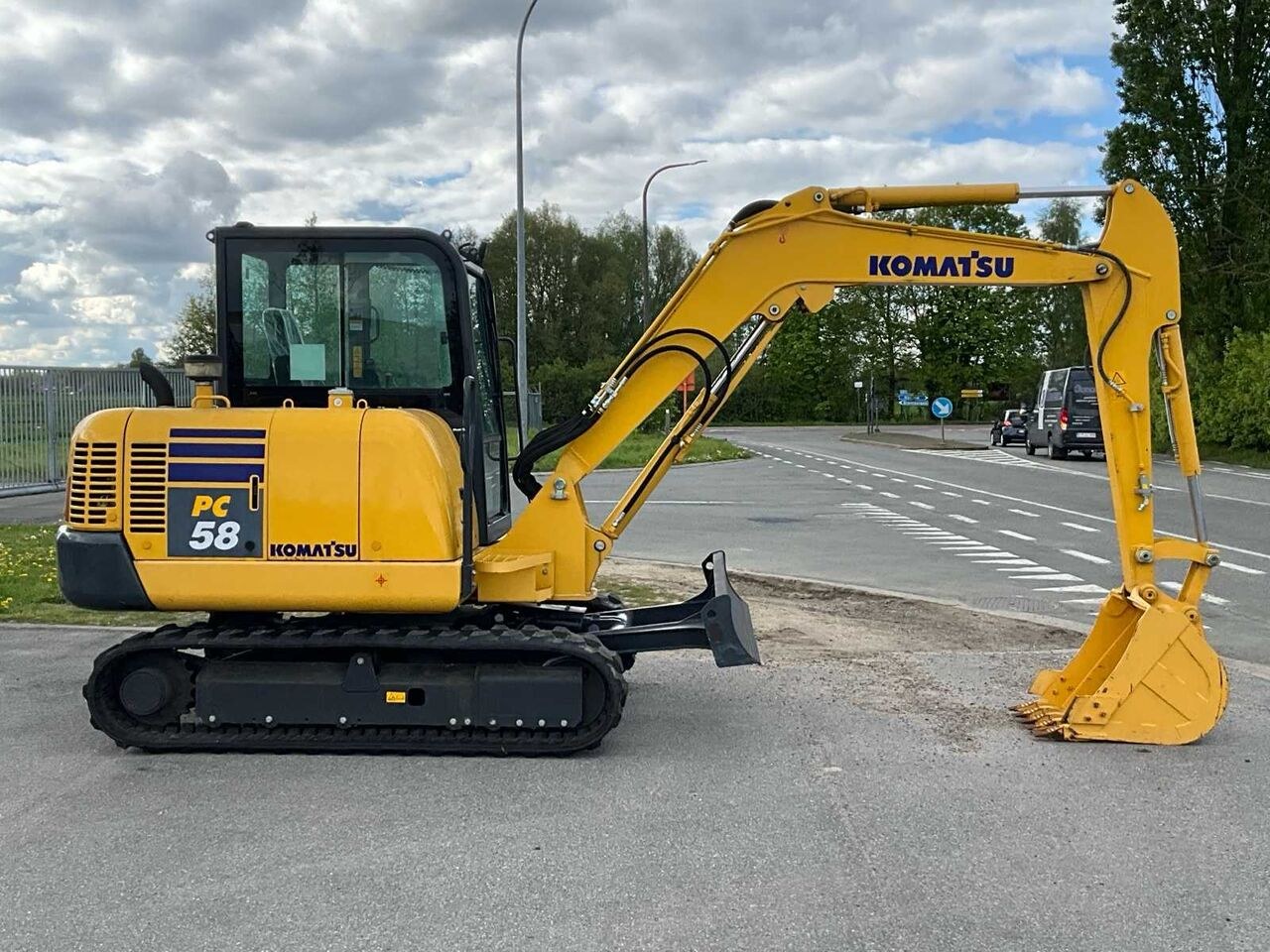 2022 Komatsu PC58-8 crawler excavator, side view 2022 Komatsu PC58-8 crawler excavator, side view