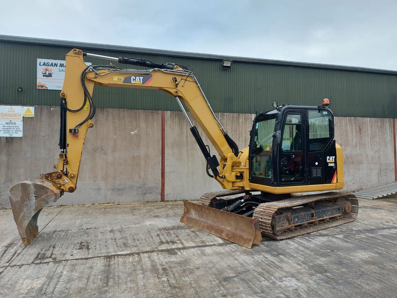 2015 Caterpillar 308E crawler excavator, side profile view 2015 Caterpillar 308E crawler excavator, side profile view