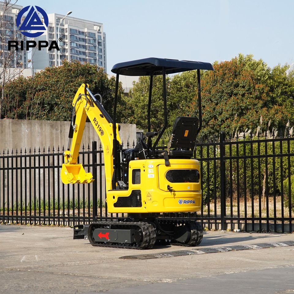 2026 Kubota R319 mini excavator, rear three-quarter view 2026 Kubota R319 mini excavator, rear three-quarter view