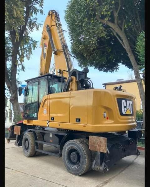 2018 Caterpillar MH3022 material handler, rear three-quarter view 2018 Caterpillar MH3022 material handler, rear three-quarter view