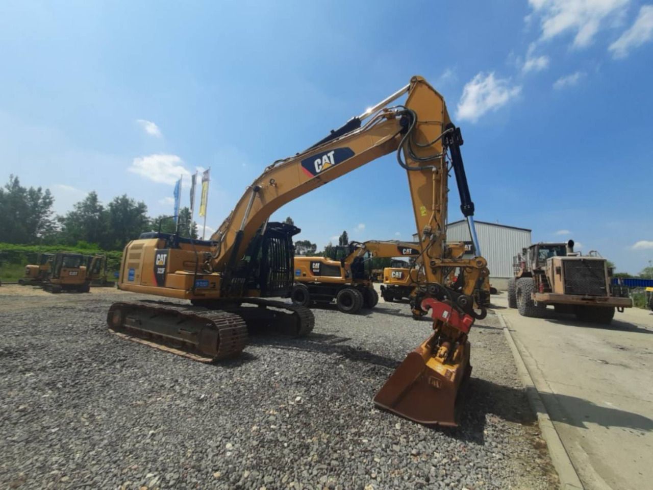 2017 Caterpillar 323FL crawler excavator, side view