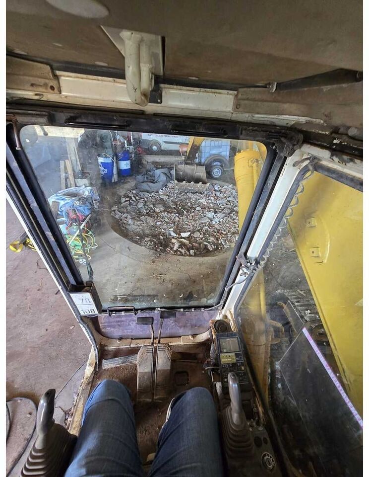 1992 Komatsu PC210LC crawler excavator operator cab interior view