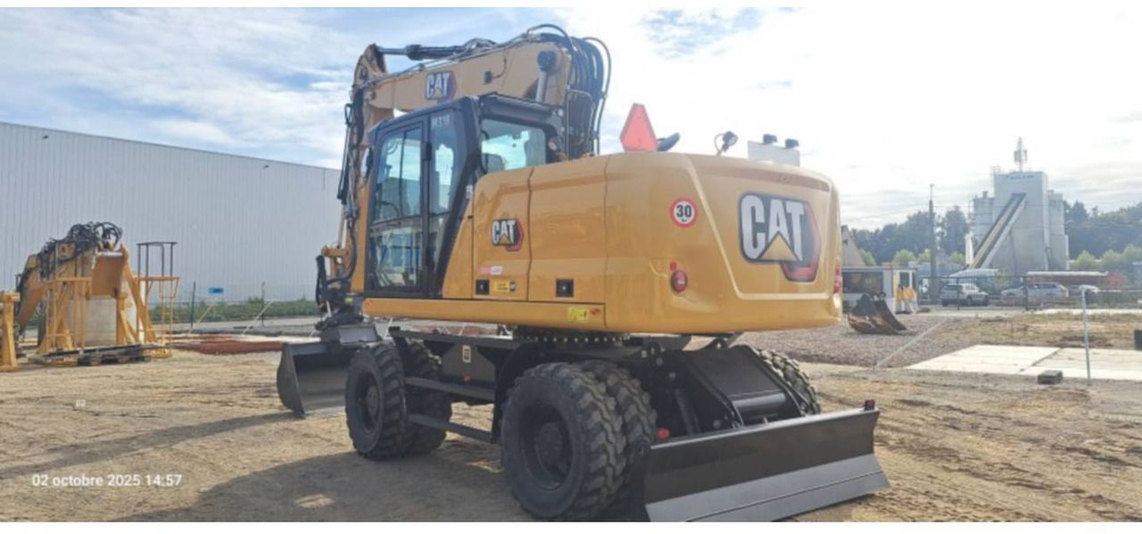 2024 Caterpillar M318-07 wheel excavator, rear three-quarter view 2024 Caterpillar M318-07 wheel excavator, rear three-quarter view