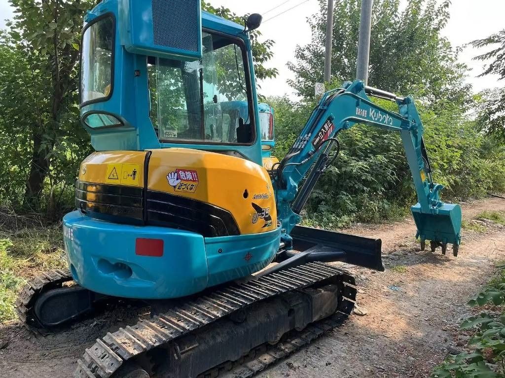 2022 Kubota U-35 mini excavator, rear three-quarter view 2022 Kubota U-35 mini excavator, rear three-quarter view