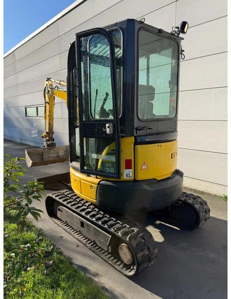 2017 Komatsu PC26MR-3 mini excavator, rear three-quarter view 2017 Komatsu PC26MR-3 mini excavator, rear three-quarter view
