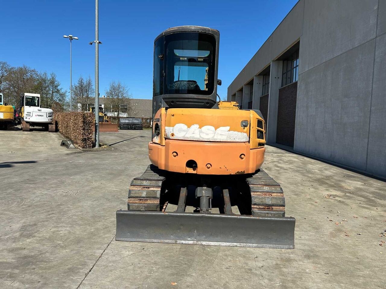 2010 CASE CX55B mini excavator, rear view