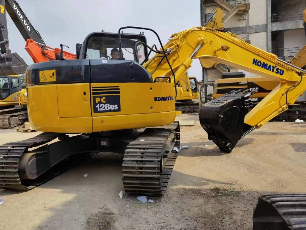 2022 Komatsu PC128US mini excavator, rear three-quarter view