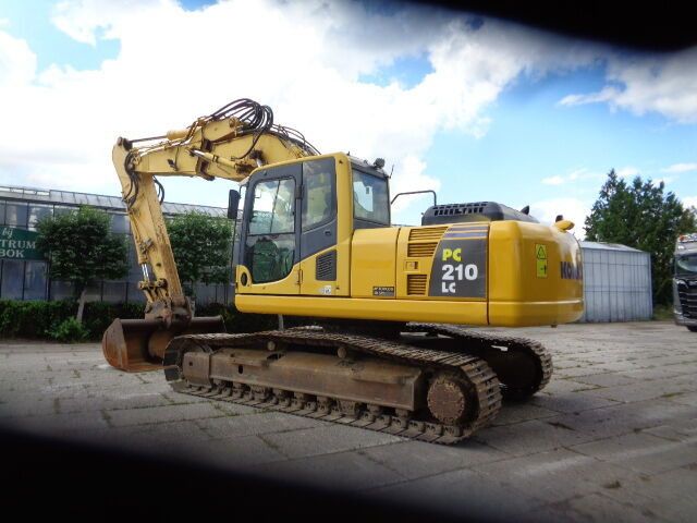 2012 Komatsu PC210LC-8 crawler excavator, side view 2012 Komatsu PC210LC-8 crawler excavator, side view