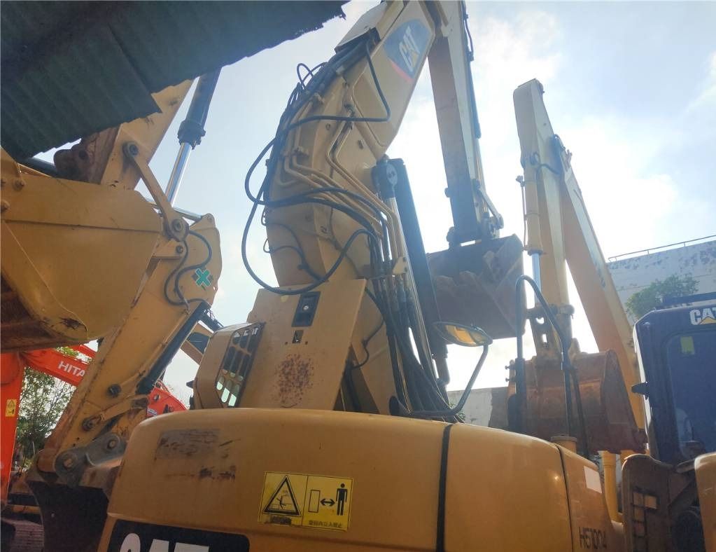 2022 Caterpillar 313C crawler excavator, close-up of boom and upper structure