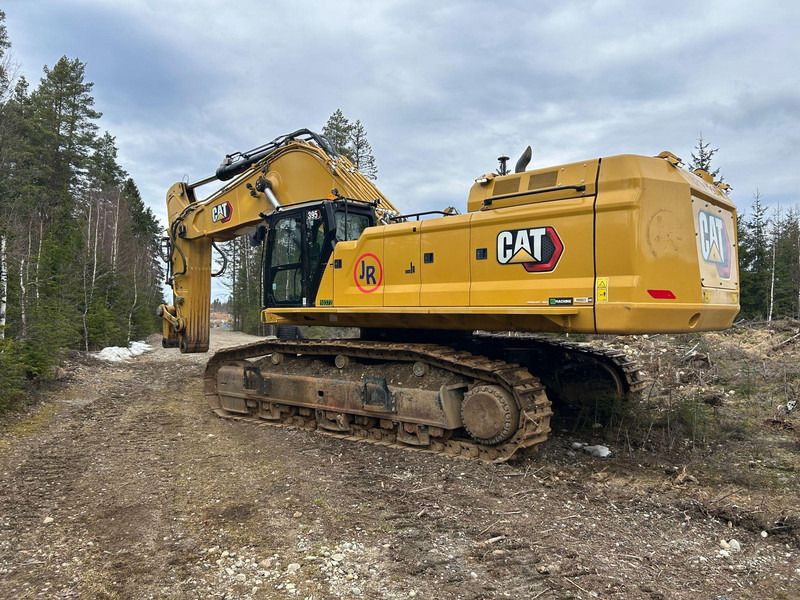 2022 Caterpillar 395-07A crawler excavator, rear three-quarter view