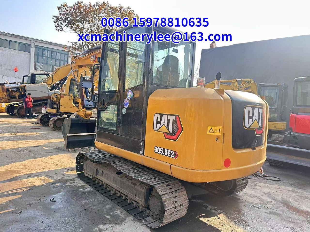 2024 Caterpillar 305.5E2 mini excavator, rear three-quarter view 2024 Caterpillar 305.5E2 mini excavator, rear three-quarter view