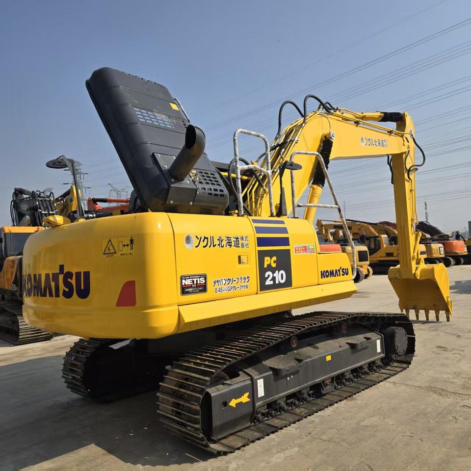 2024 Komatsu PC210 crawler excavator, rear three-quarter view 2024 Komatsu PC210 crawler excavator, rear three-quarter view
