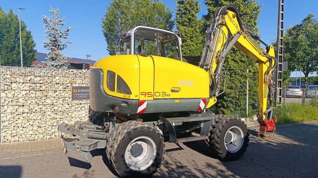 2013 Wacker Neuson 9503 wheel excavator, rear three-quarter view