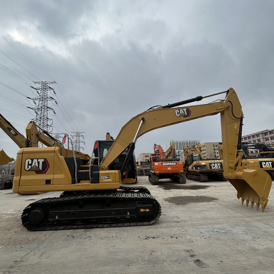 2023 Caterpillar 320GC crawler excavator, side profile view 2023 Caterpillar 320GC crawler excavator, side profile view