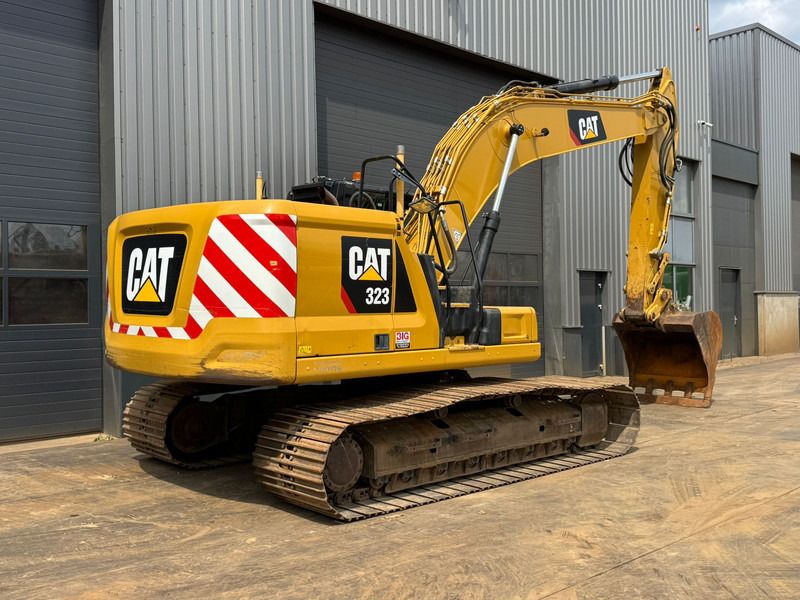 2018 Caterpillar 323-07A crawler excavator, rear three-quarter view 2018 Caterpillar 323-07A crawler excavator, rear three-quarter view