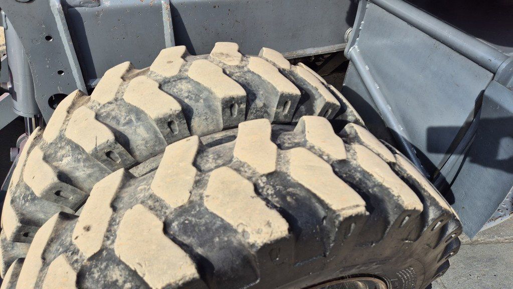 2021 Takeuchi TB295W wheel excavator dual tires close-up
