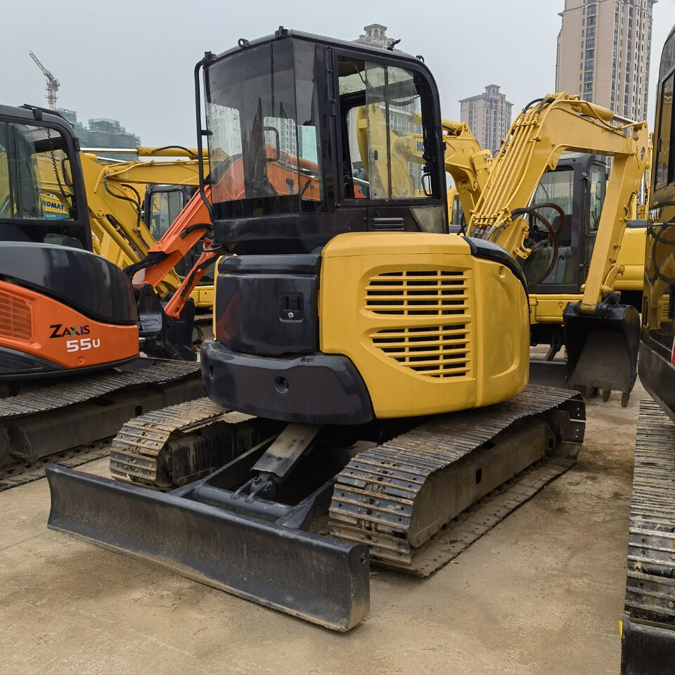 2022 Komatsu PC-55MR mini excavator rear three-quarter view 2022 Komatsu PC-55MR mini excavator rear three-quarter view