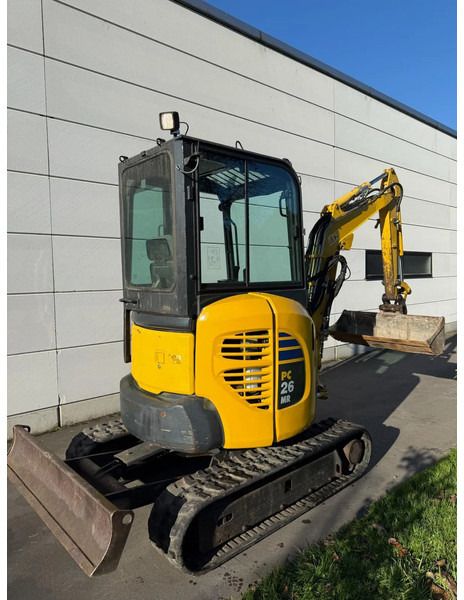 2017 Komatsu PC26MR-3 mini excavator, rear three-quarter view 2017 Komatsu PC26MR-3 mini excavator, rear three-quarter view