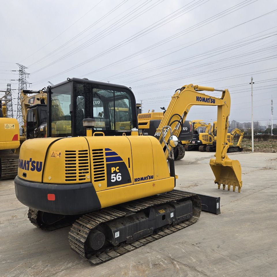 2023 Komatsu PC56 mini excavator, rear three-quarter view 2023 Komatsu PC56 mini excavator, rear three-quarter view