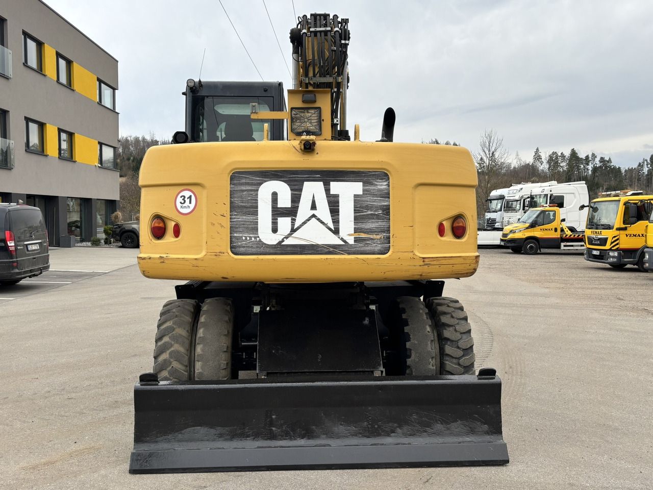 2012 Caterpillar M315D wheel excavator rear view 2012 Caterpillar M315D wheel excavator rear view