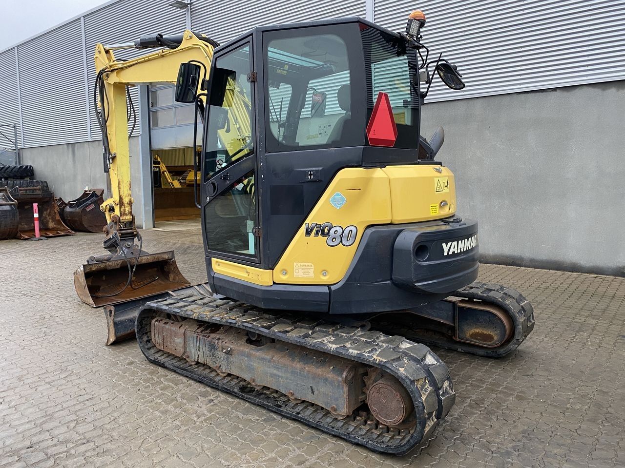 2017 Yanmar VIO80-1A mini excavator, rear three-quarter view 2017 Yanmar VIO80-1A mini excavator, rear three-quarter view